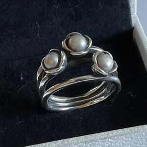 Pandora ring with three gray pearls
